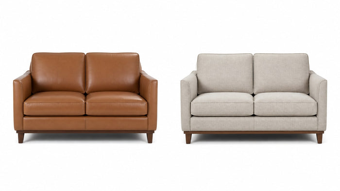 A side-by-side image of a leather loveseat and a fabric loveseat on white background displaying their upholstery and style differences clearly.
