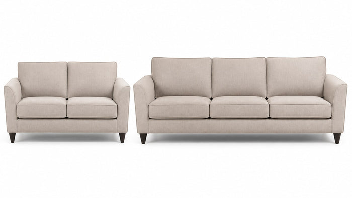 Modern two-seat loveseat with upholstered cushions and armrests on a white background in studio lighting.