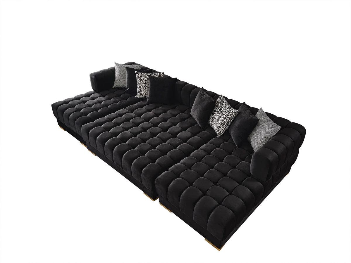 Close-up of black velvet tufted upholstery on Mia Rectangle Ottoman