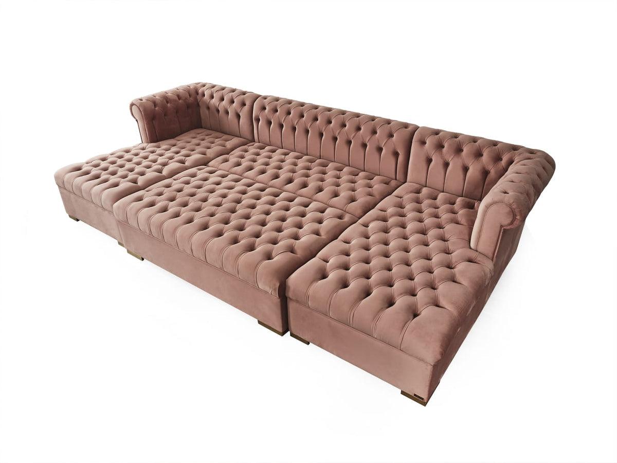Emma Pink Velvet Rectangle Ottoman side angle showing padded top