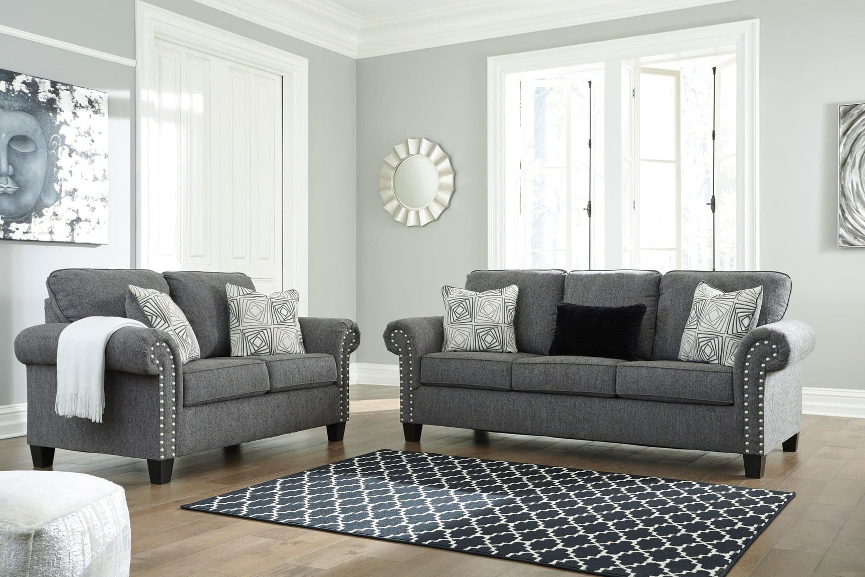 Ashley charcoal fabric upholstered sofa and loveseat set front view