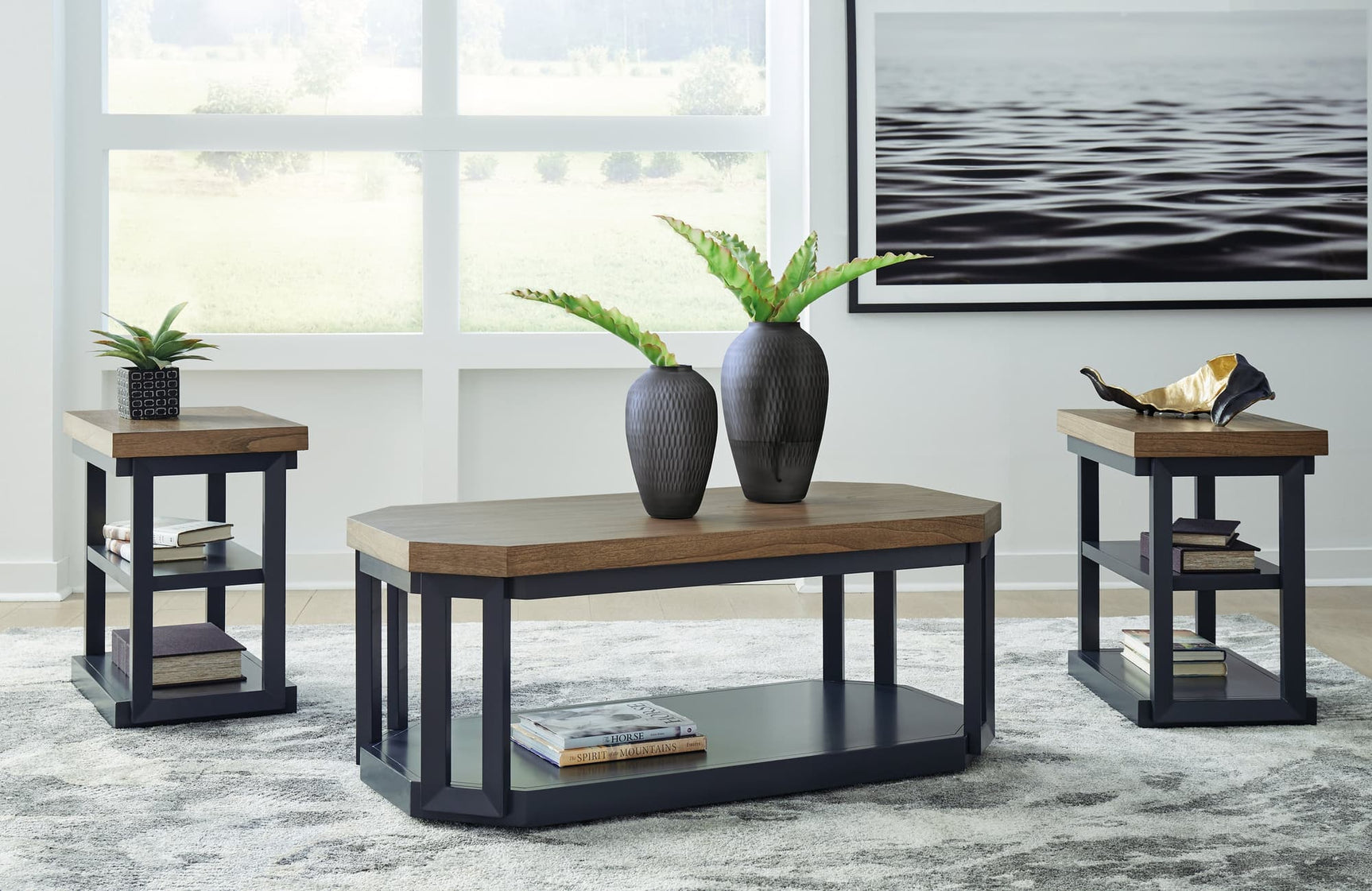 Landocken coffee table with brown wood-tone tabletop and slate blue frame showing casters