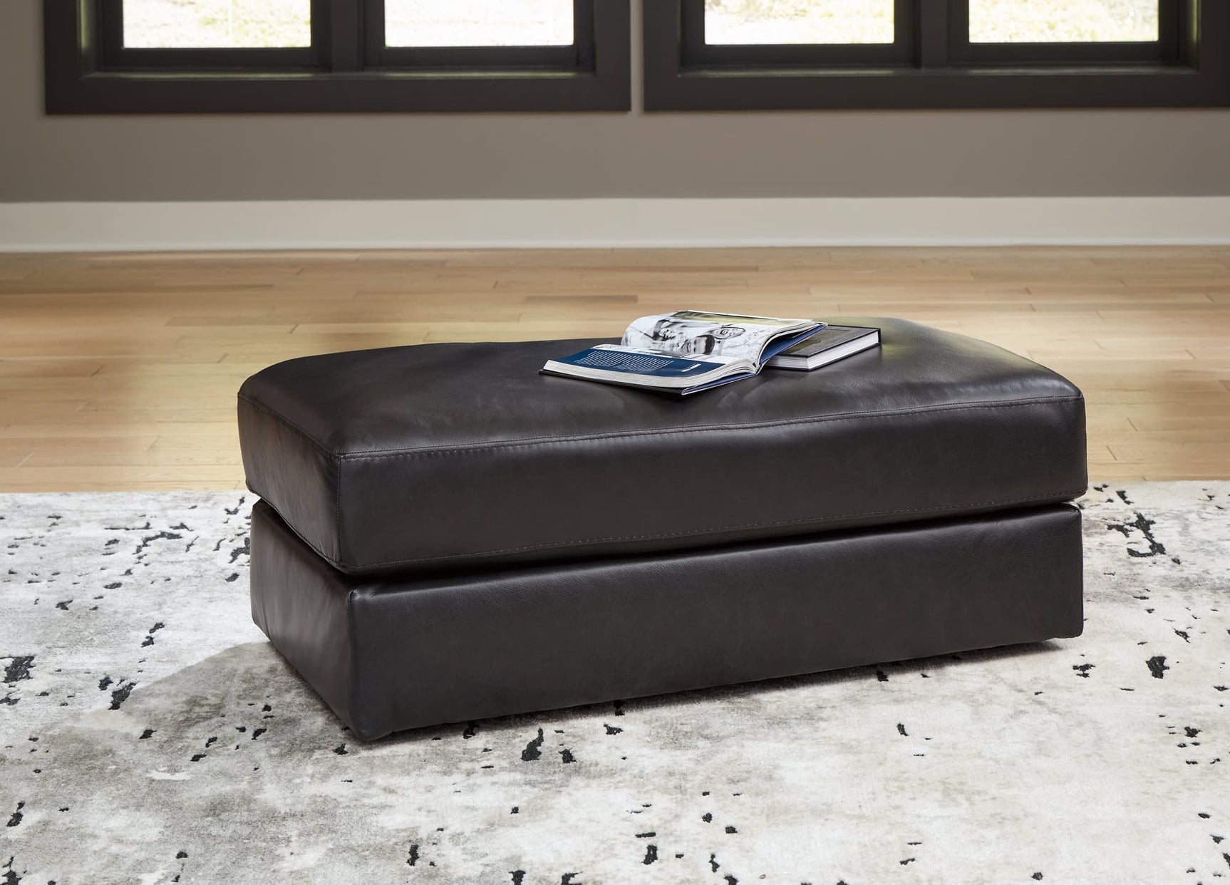 Amiata Onyx Leather Match Ottoman front angle