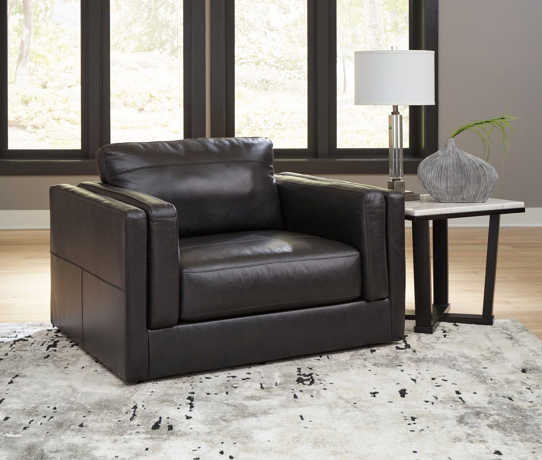 Amiata Onyx Leather Oversized Chair front angle view