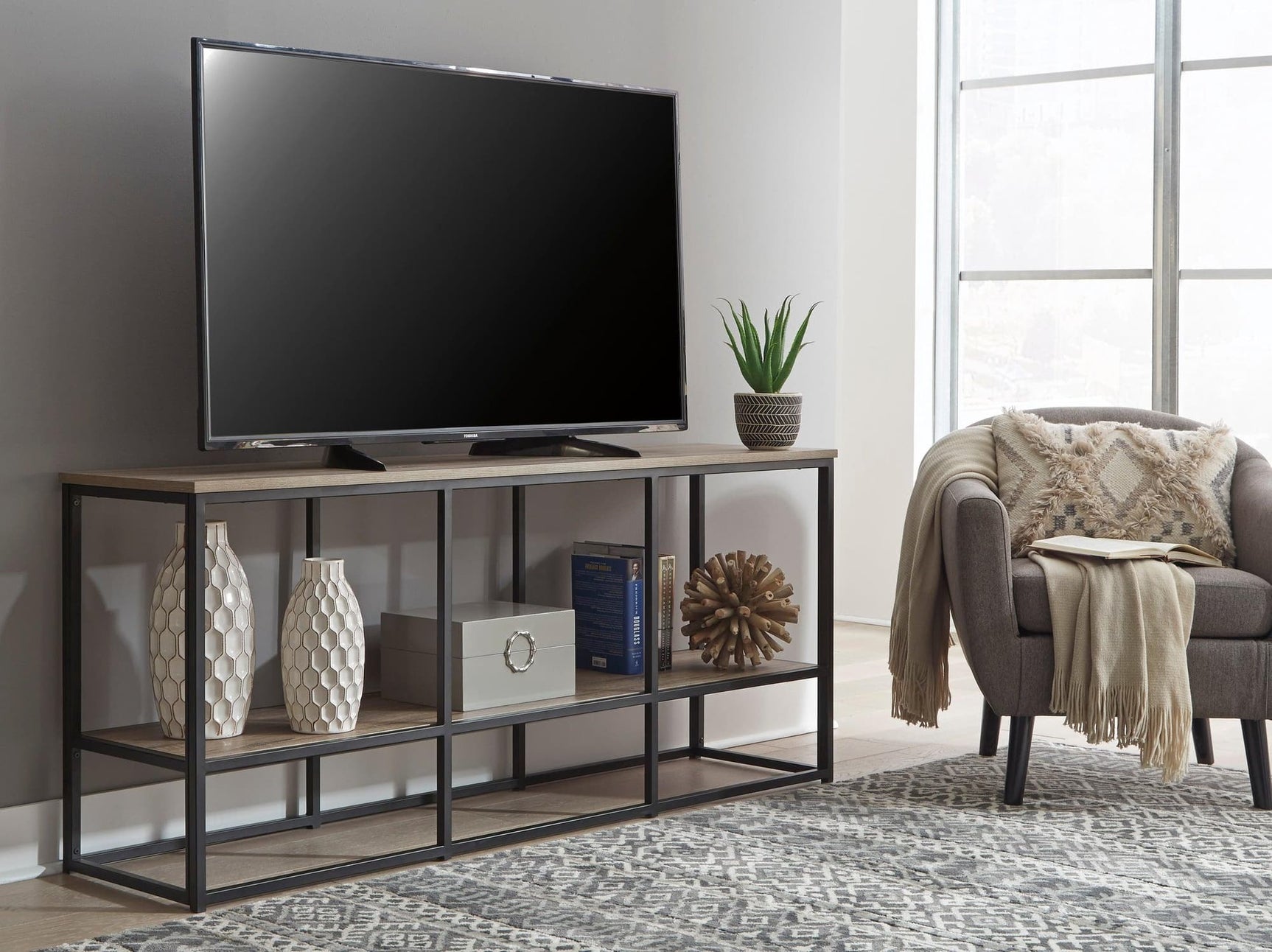 Wadeworth black and brown industrial TV stand angled front view