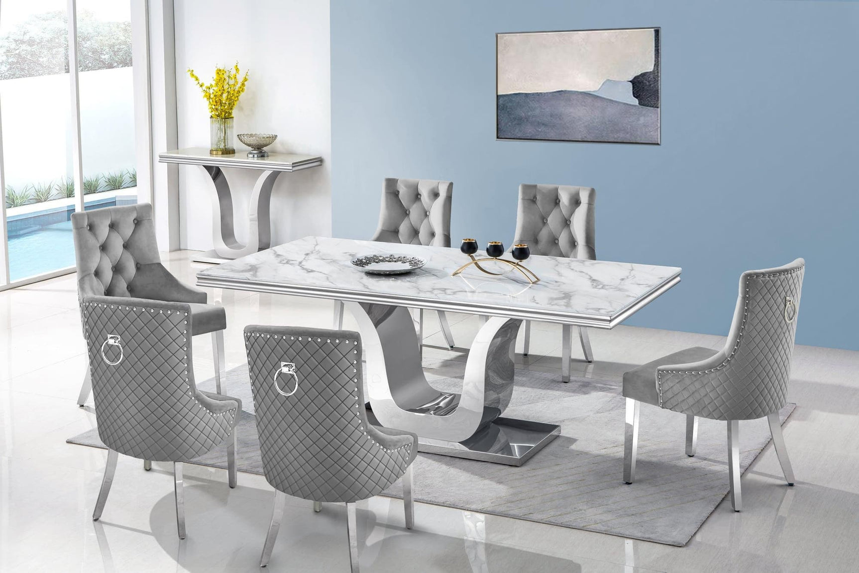Main view of gray marble dining table with six grey chairs
