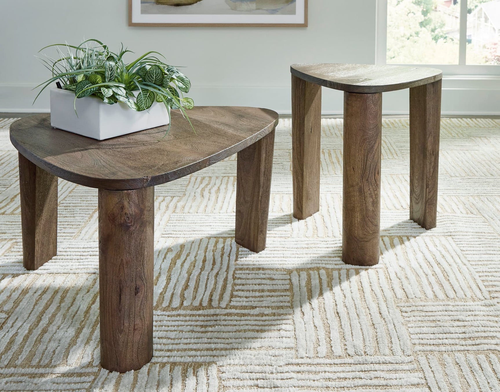 Reidport Accent Cocktail Table Set large table front angle