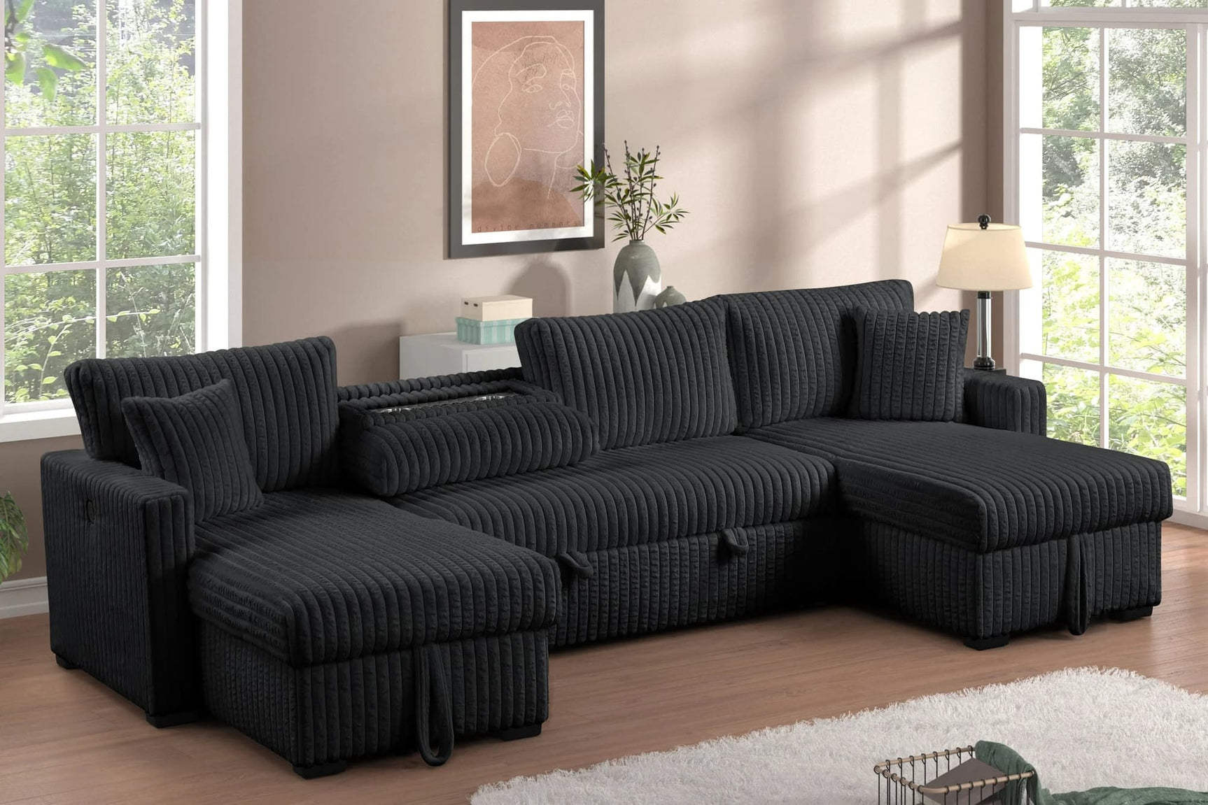 Front view of July Black sectional sofa with double storage chaise and pull-out bed