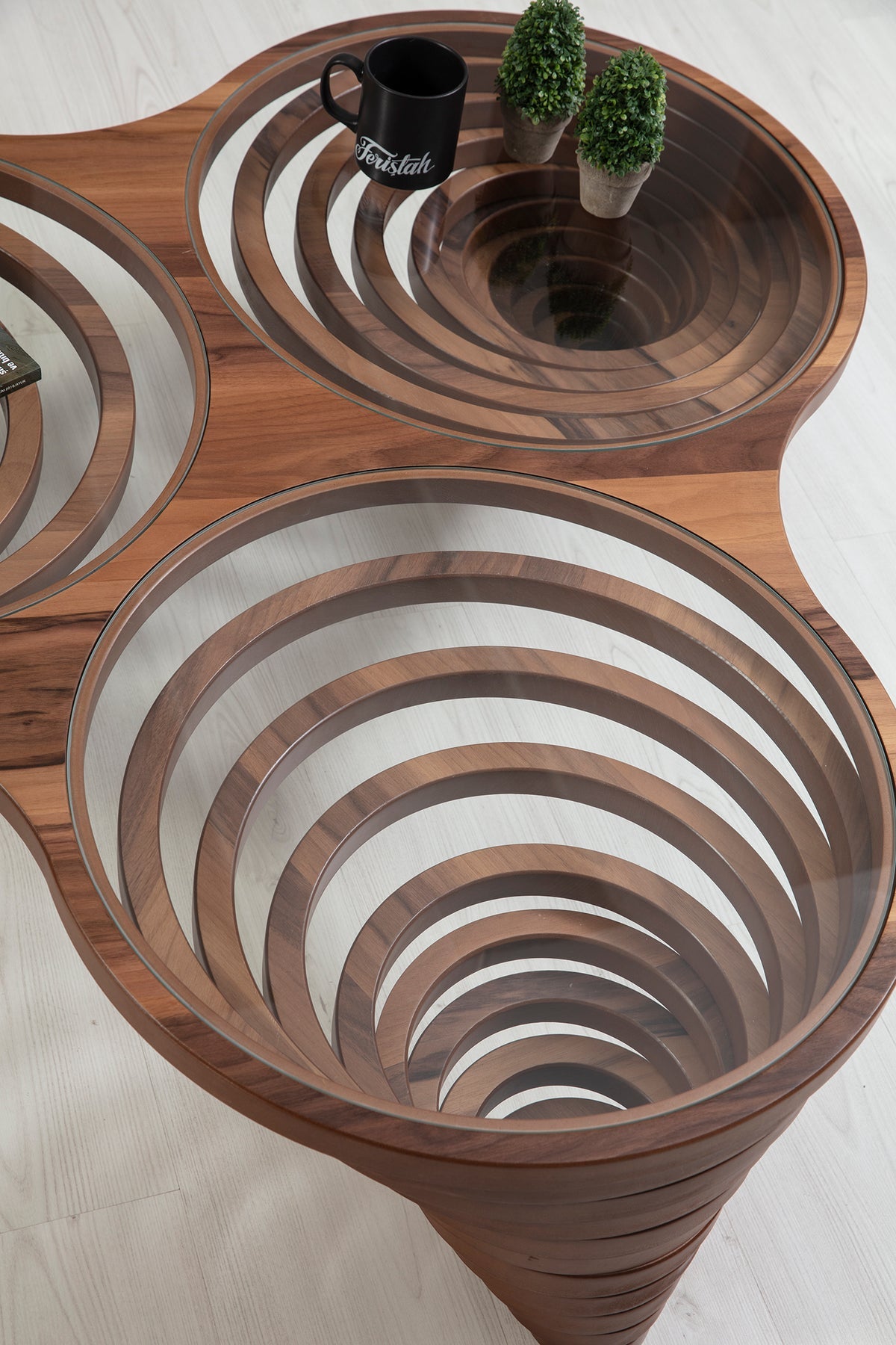 Side view of Olga Walnut Coffee Table showcasing sleek modern design