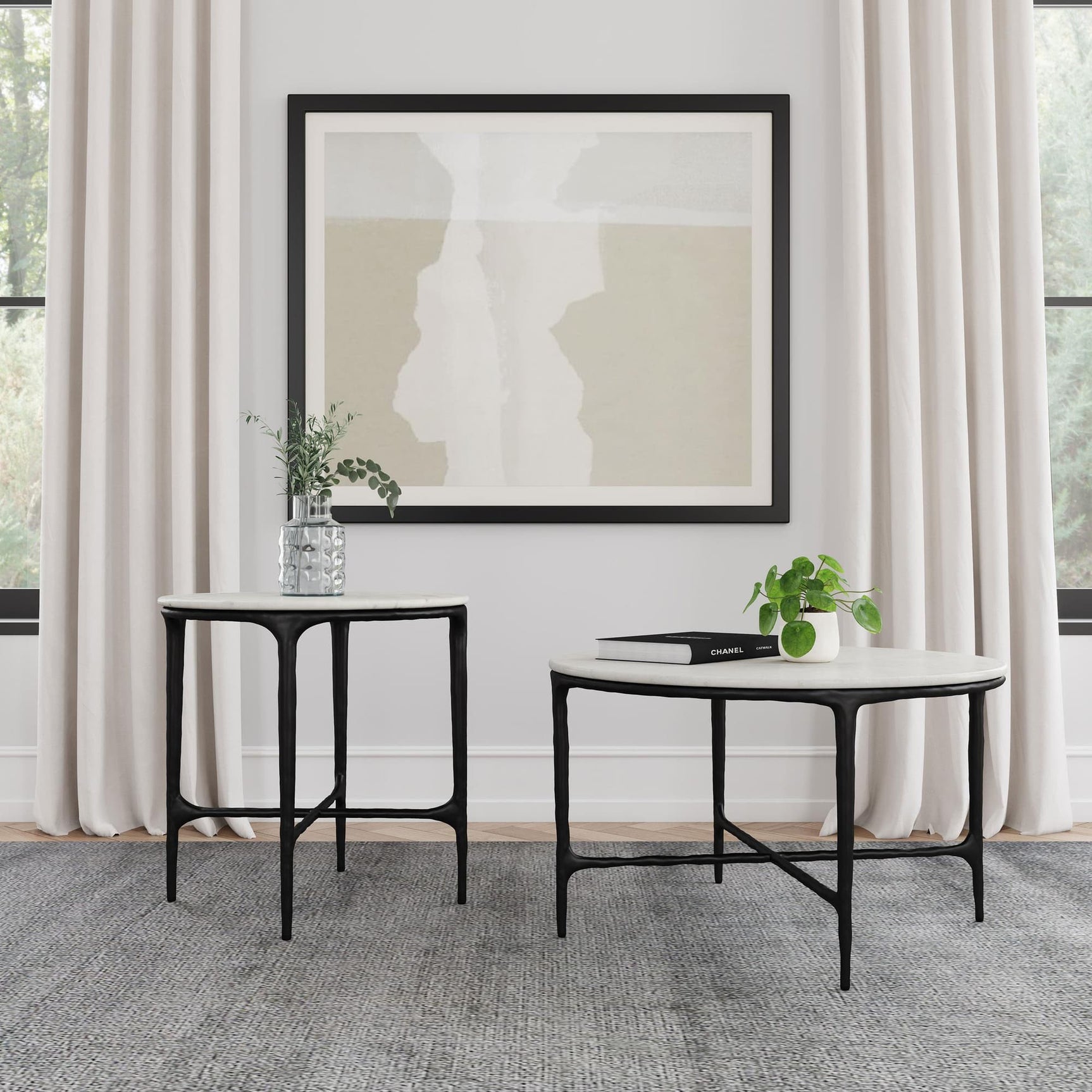 Hermas round white marble coffee table with iron frame - front angle
