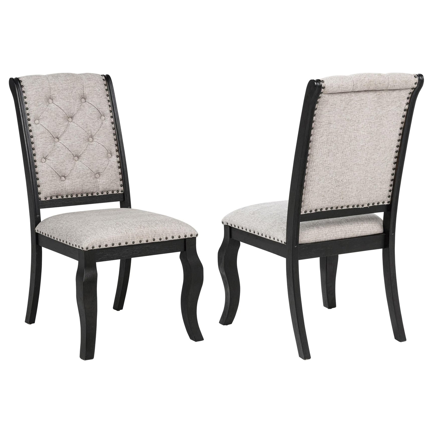 Phelps tan upholstered dining side chair with tufted back and bronze nailhead trim, front view