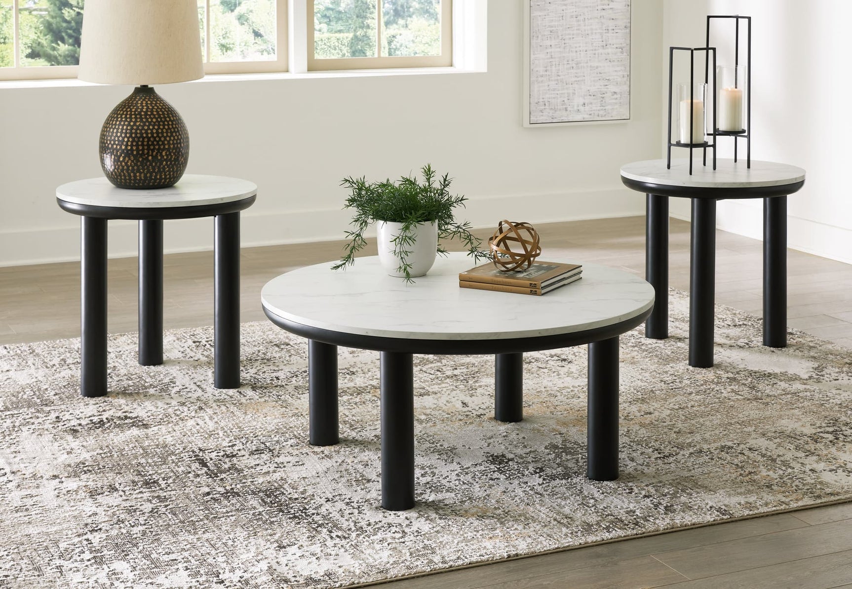 Xandrum black and white round coffee table front view