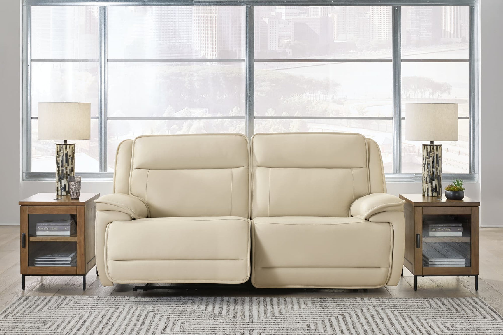 Double Deal almond leather 2-piece power reclining loveseat sectional front view