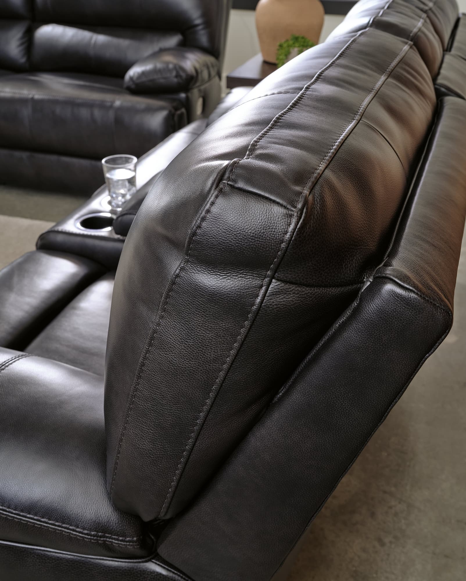 Mountainous Eclipse black leather sofa and loveseat front view