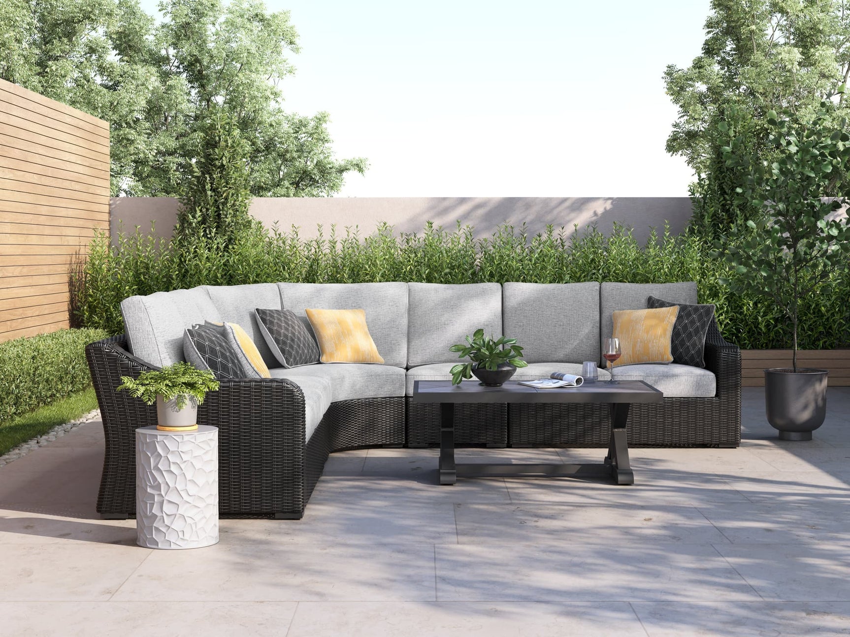 Beachcroft 5-Piece Outdoor Sectional with black frame and light gray cushions front angle