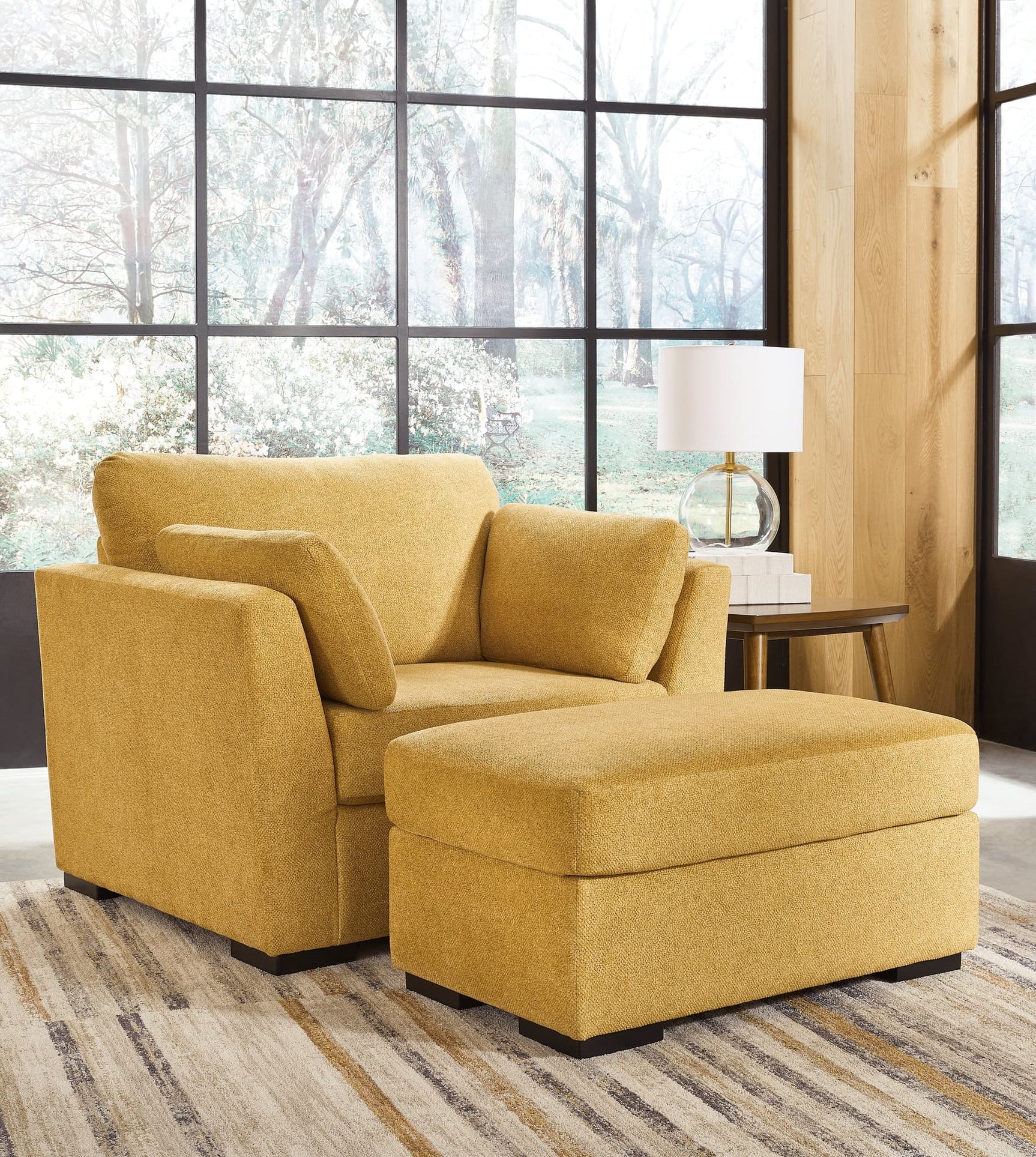 Front angle of Keerwick Sunflower velvet chair with matching ottoman