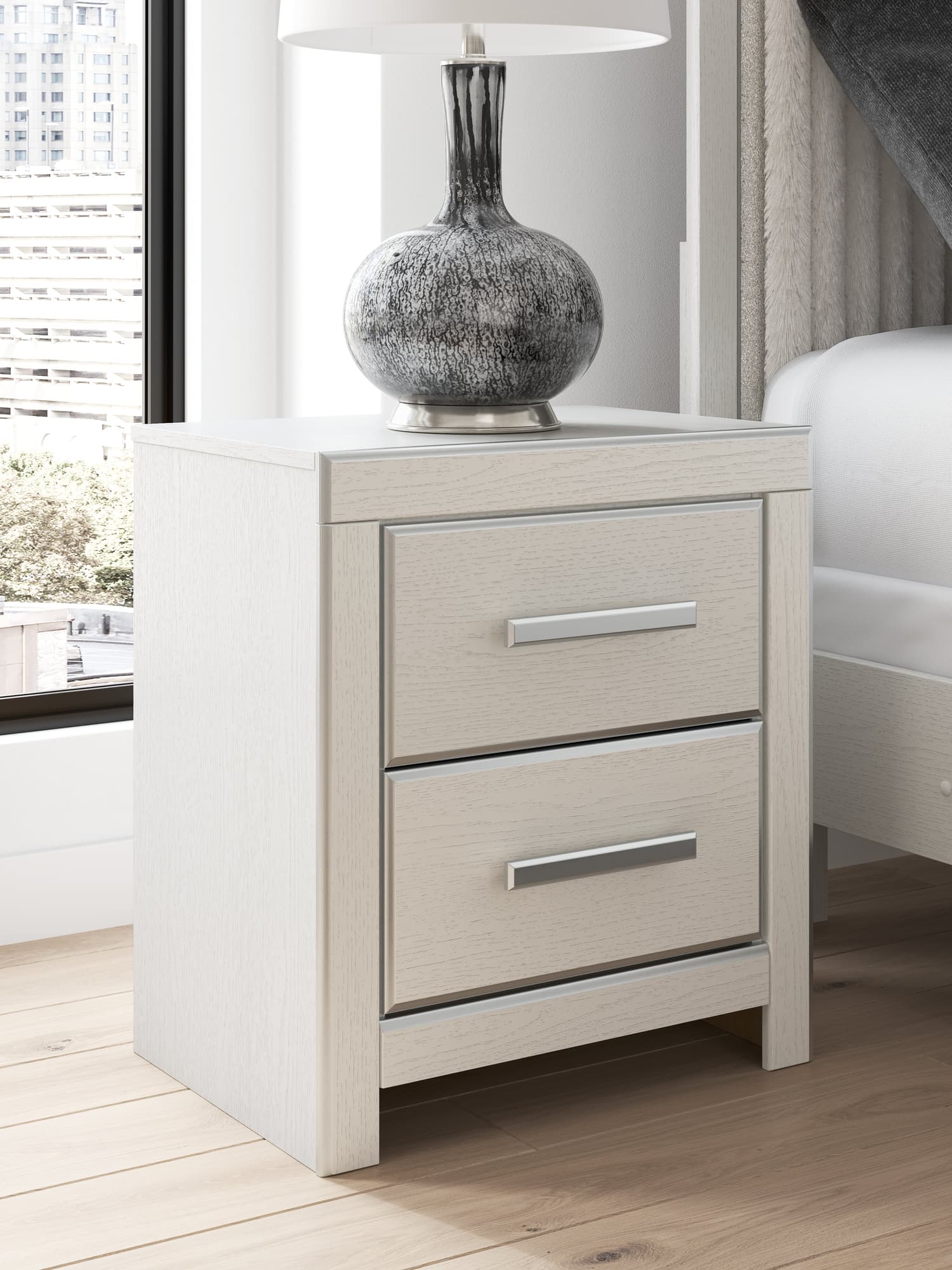 Zuraleus White Nightstand front view with drawers closed