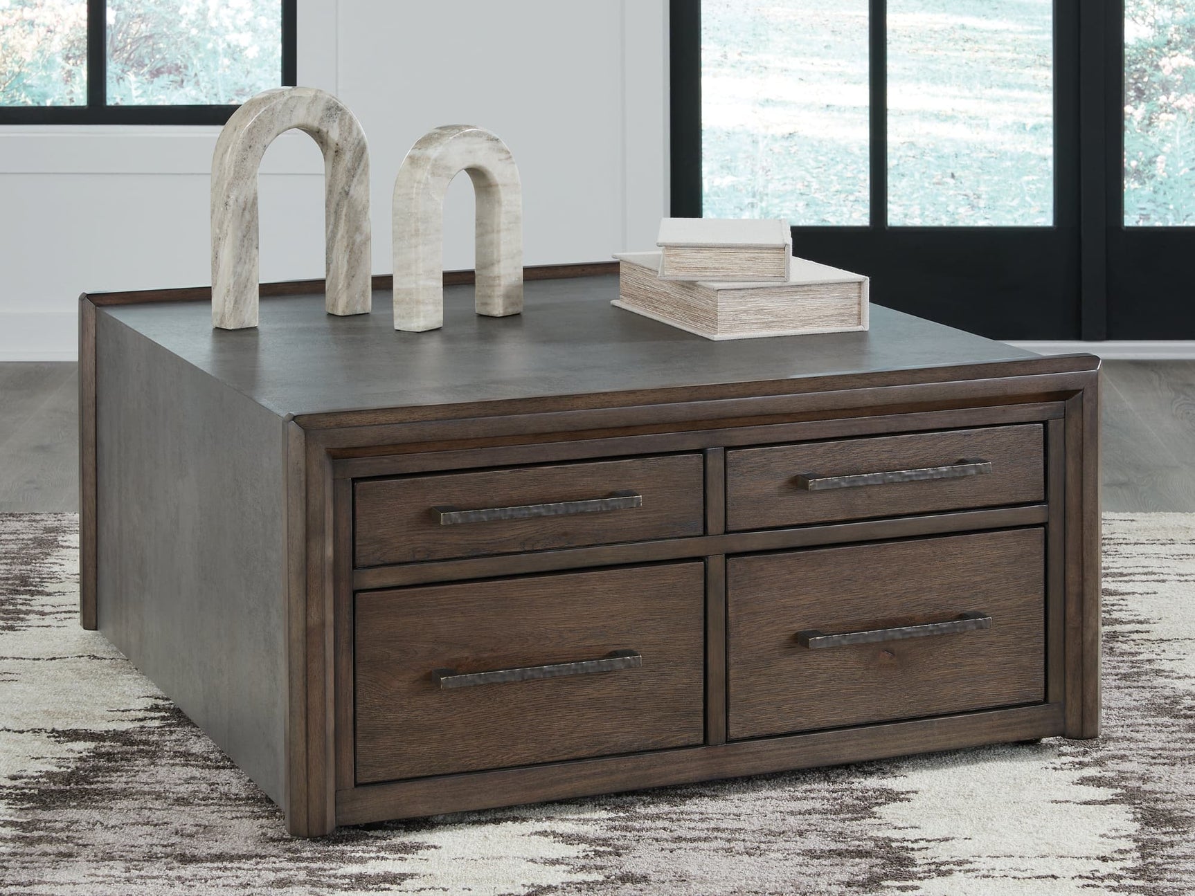 Kallenny Brown and Gray Coffee Table front angle closed view
