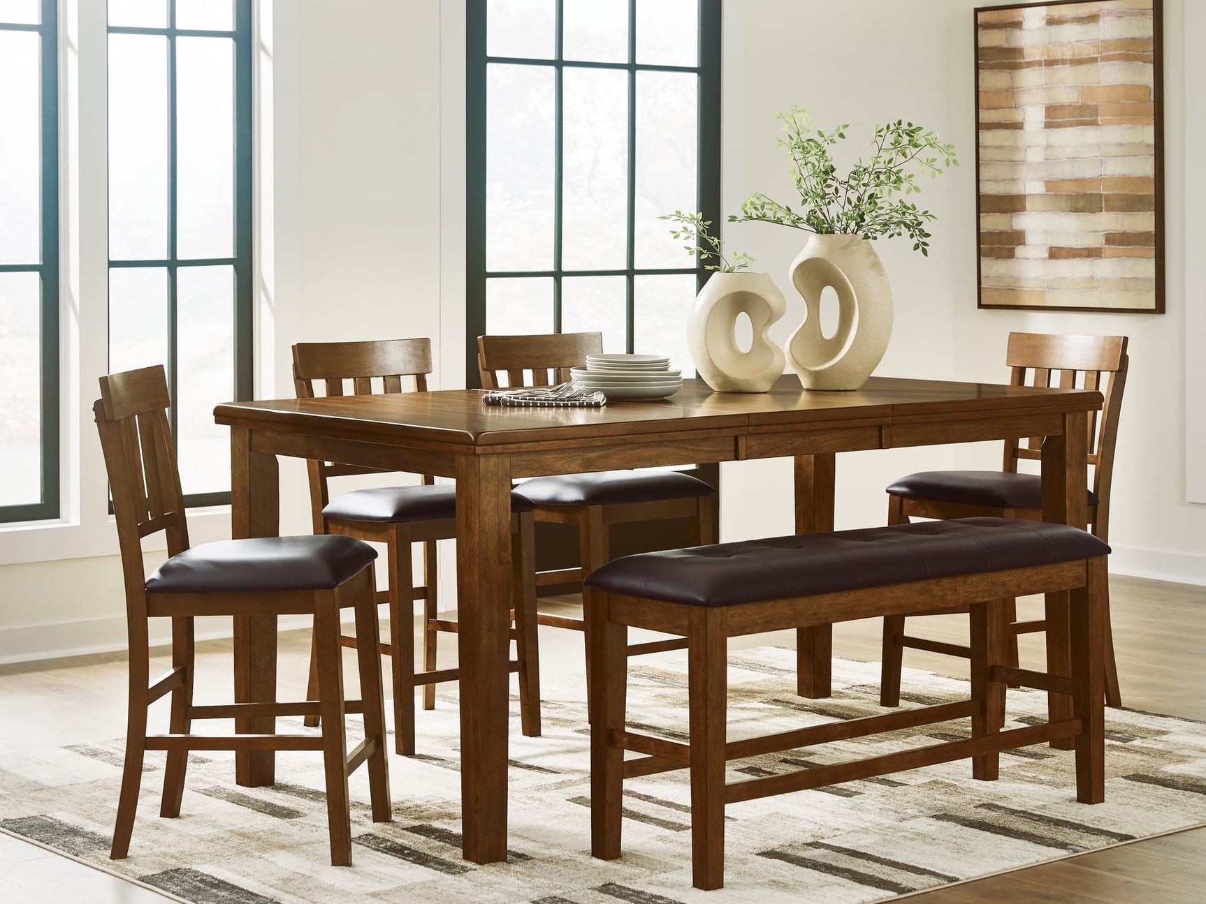 Ralene medium brown rustic counter height dining table with four barstools and bench - front view