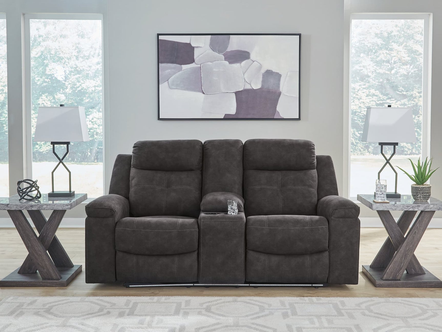 Brysonview charcoal faux leather reclining loveseat with console front view