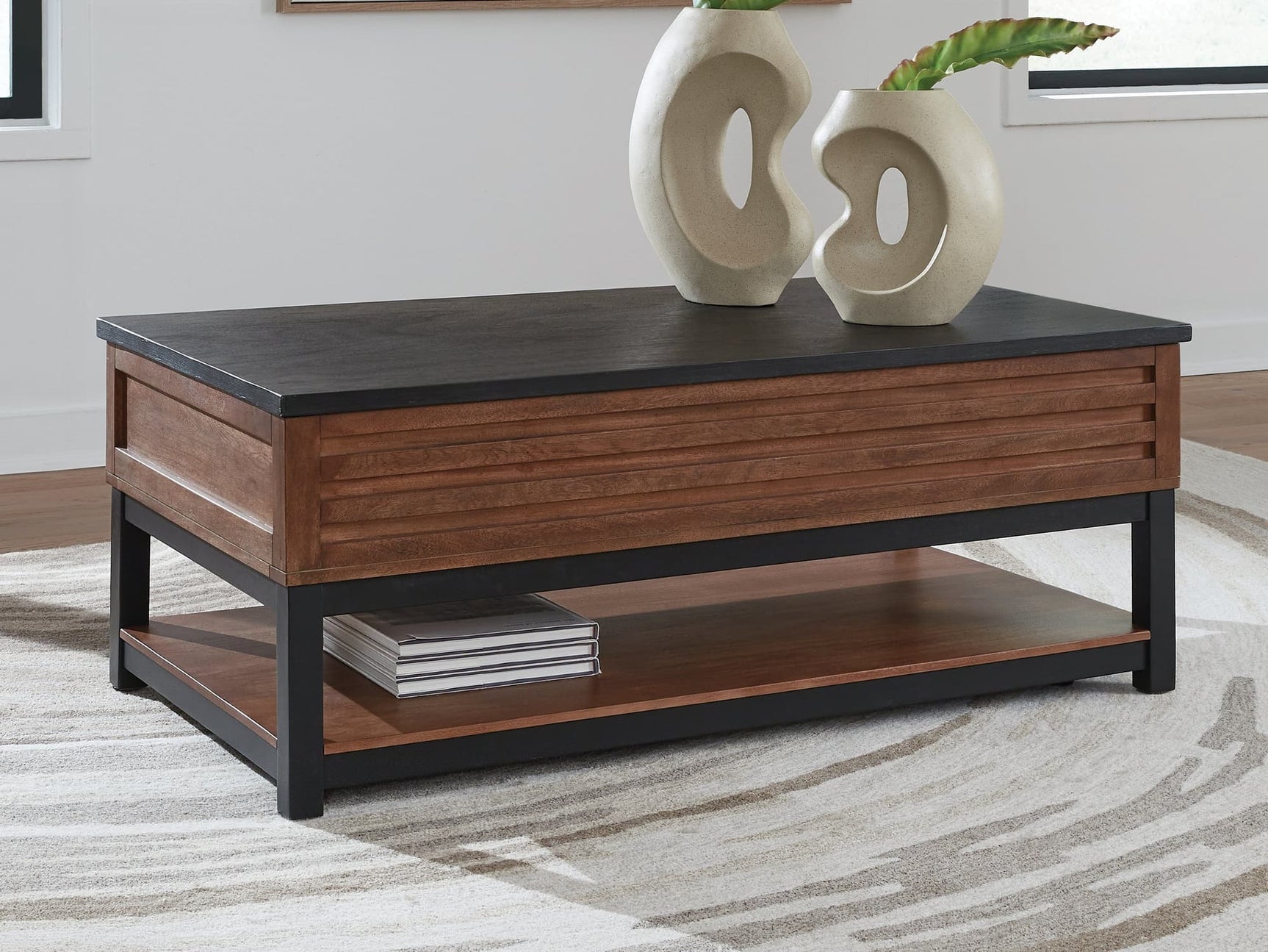 Kallari Warm Brown and Black Lift-Top Coffee Table front view