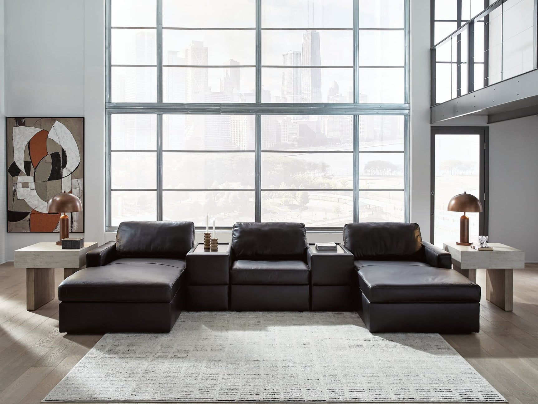 Front view of Modmax II black leather 5-piece double chaise sectional with storage consoles