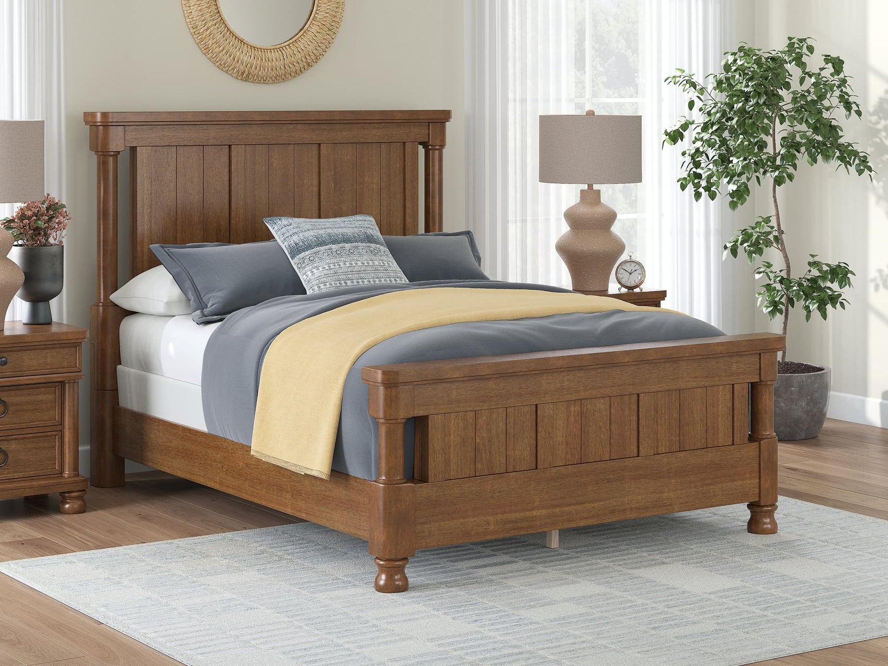 Rowlenstown Brown Queen Poster Bed, front view showing poster headboard and footboard