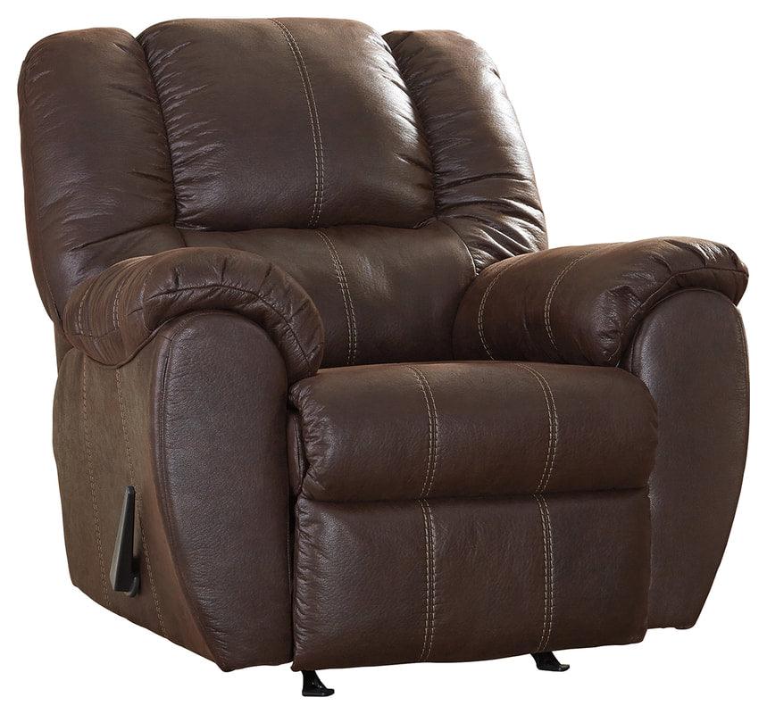 Ashley Walnut Rocker Recliner with exterior handle and pillow arms, side angle