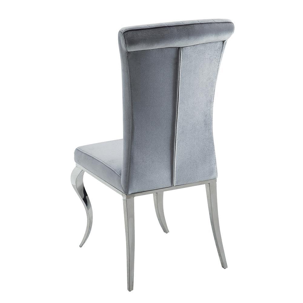 Side view of Betty upholstered dining chair in grey velvet with chrome frame