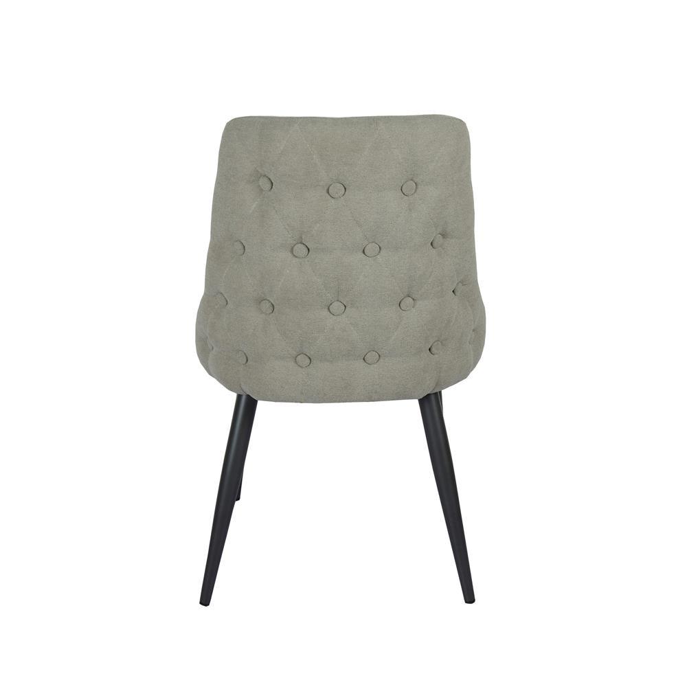 Cosmo chair showing tapered wooden legs and armrests