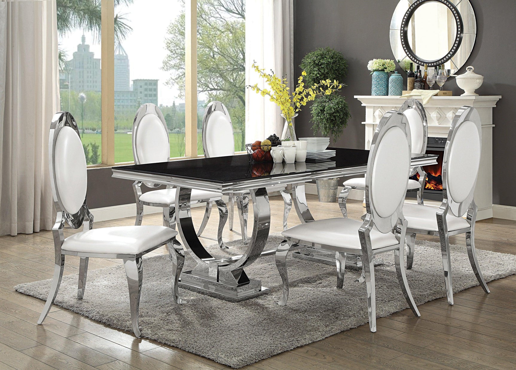 Chrome leg detail with ring design on Antoine table