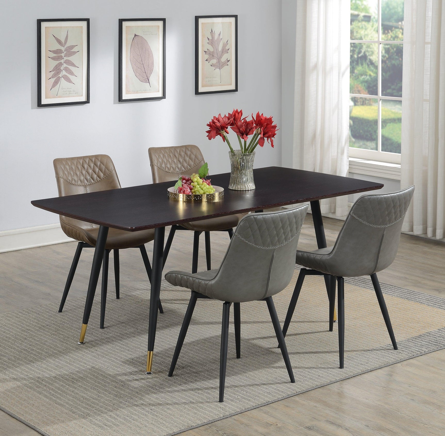 Brassie dining chairs in modern dining setup, grey upholstery