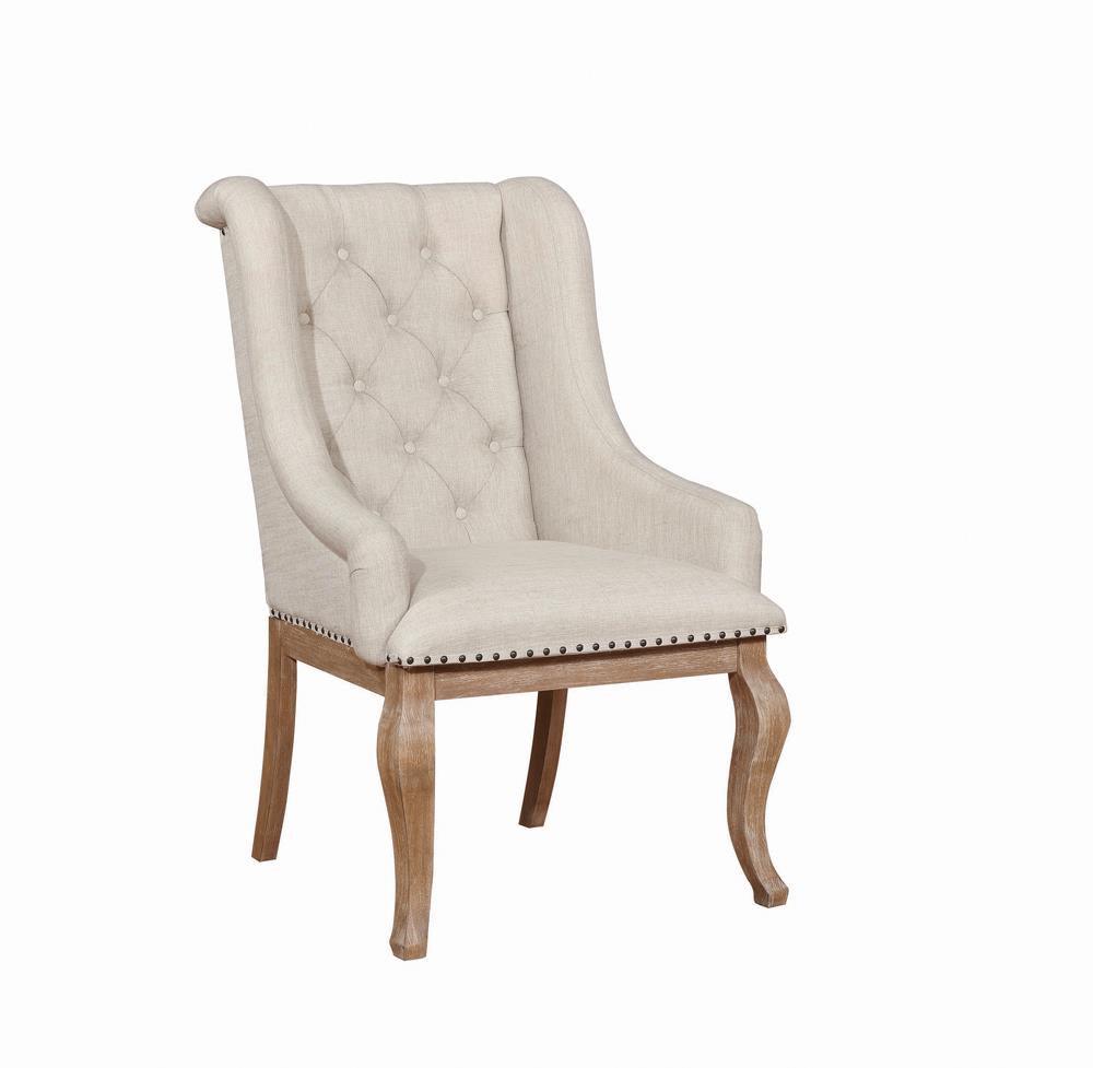 Side angle of Brockway Cove tufted arm chair showing rolled arms and upholstery