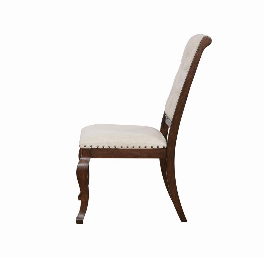 Brockway Cove Tufted Dining Chairs Cream And Antique Java - side profile showing carved legs