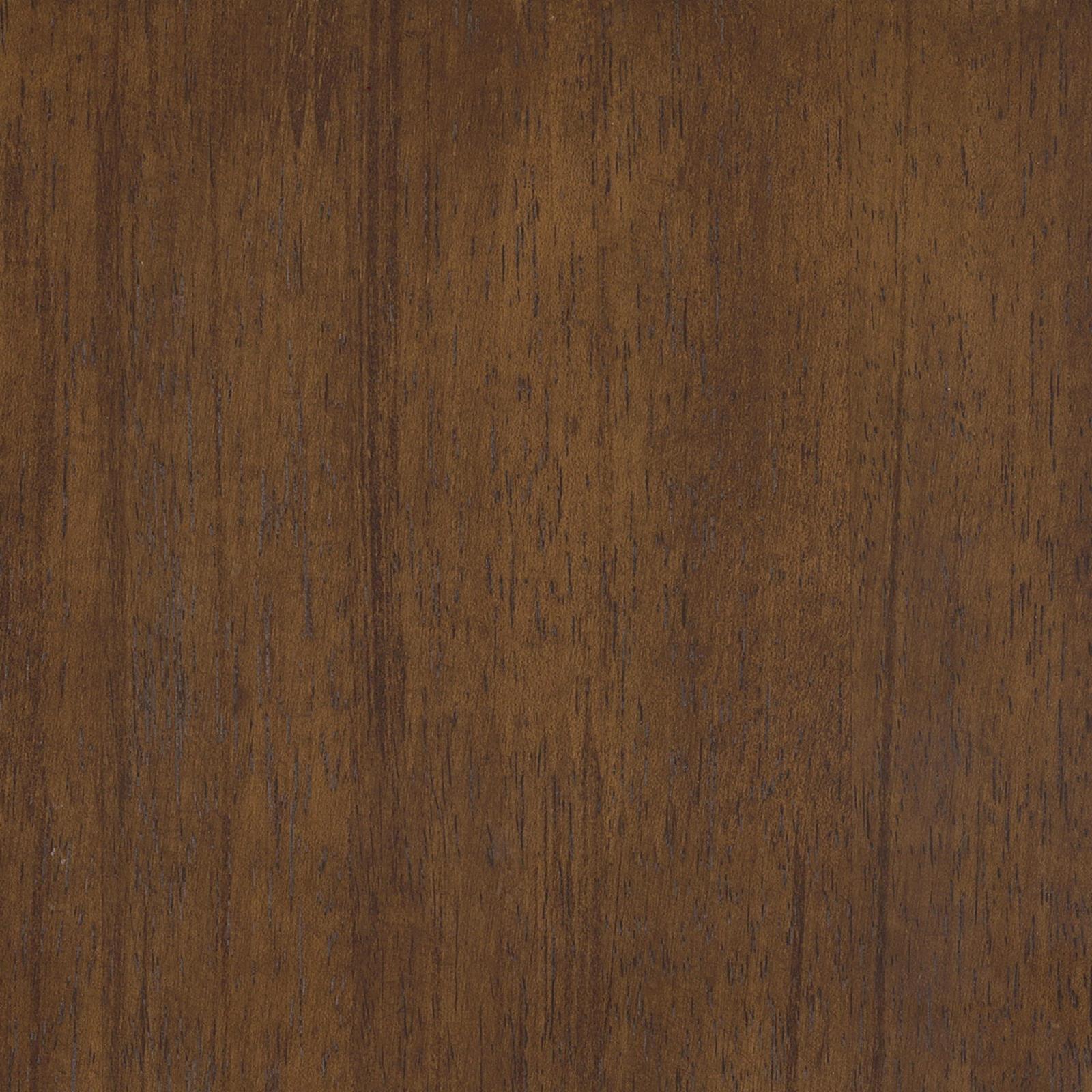 Detail of seat cushion and tapered wood legs on Dewey Upholstered Chair