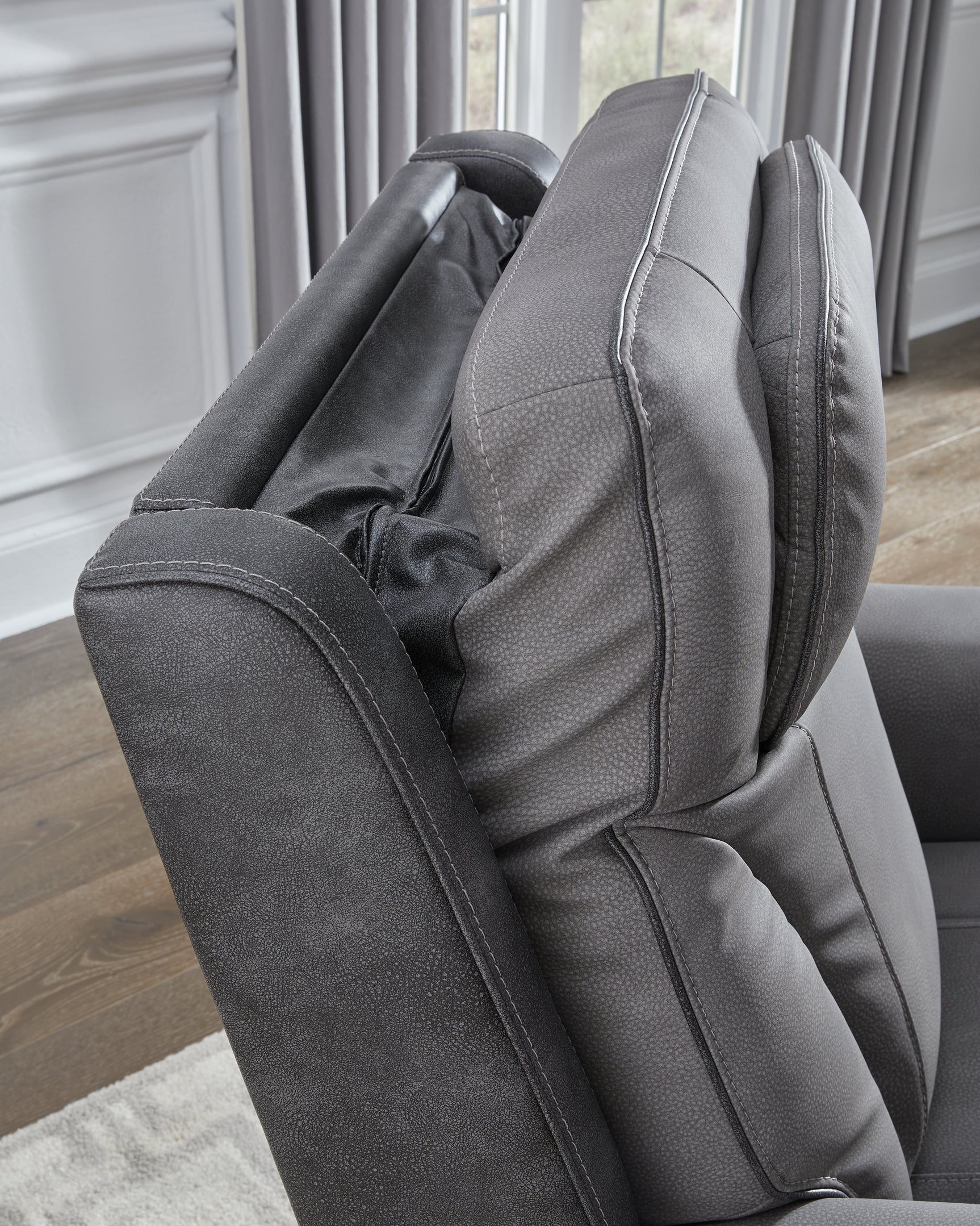 Pocket storage on Ashley power lift recliner