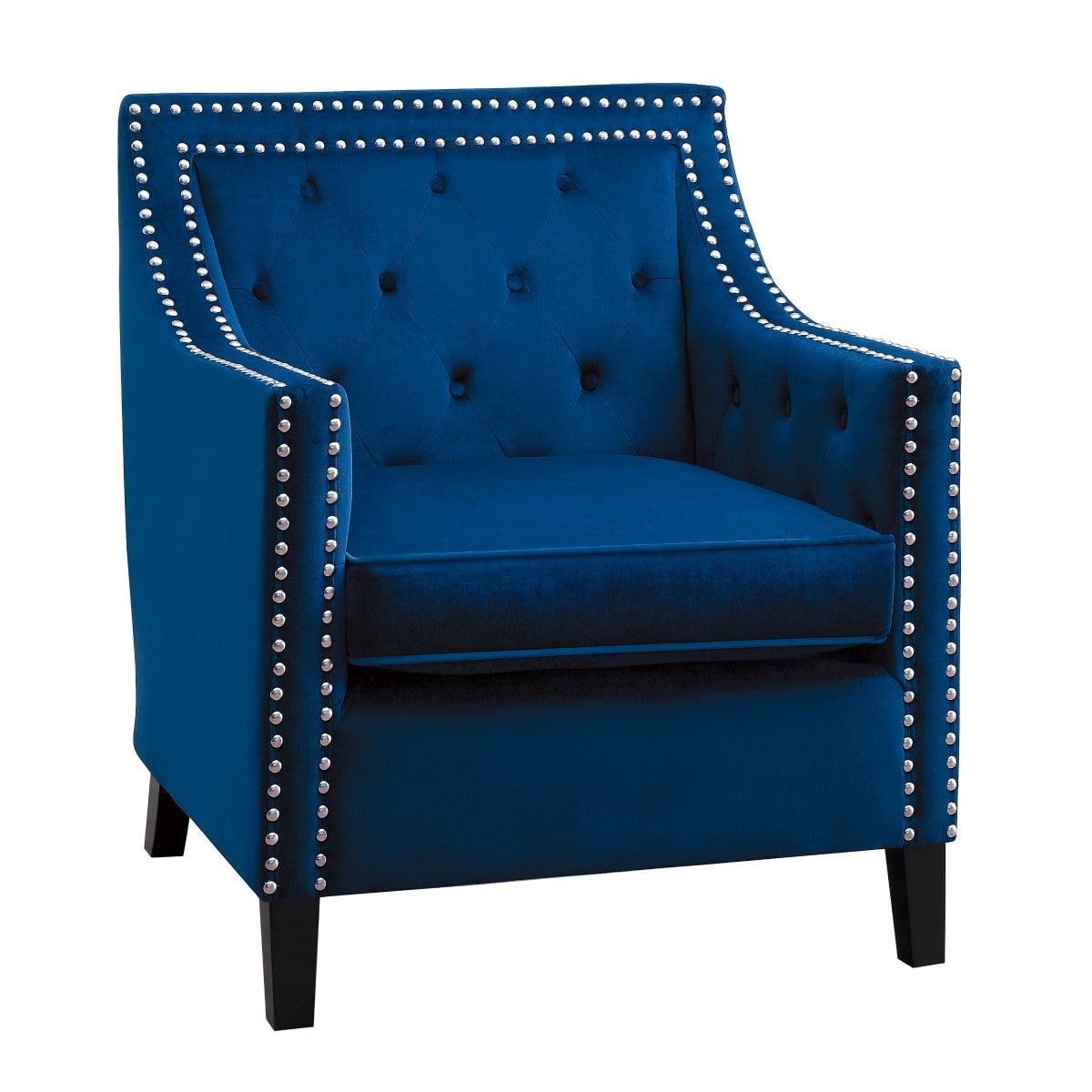 Side angle of Grazioso navy velvet tufted accent chair showing sloped arms