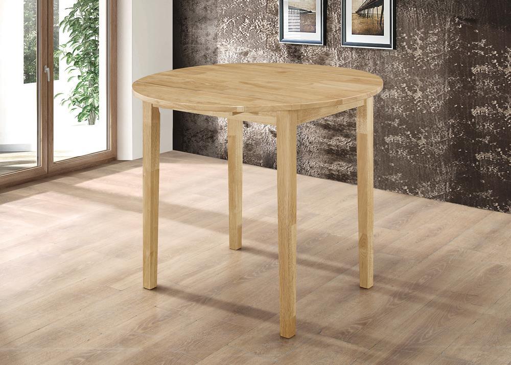 Round dining table set in room setting