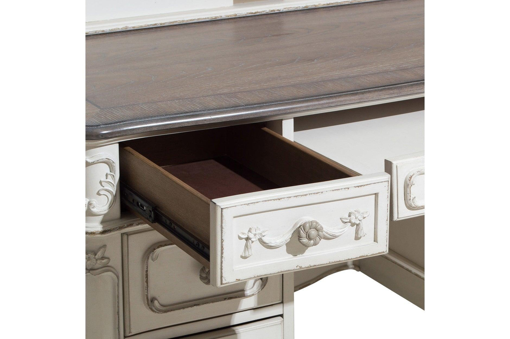 Open drawer of the Cinderella writing desk showing solid wood craftsmanship