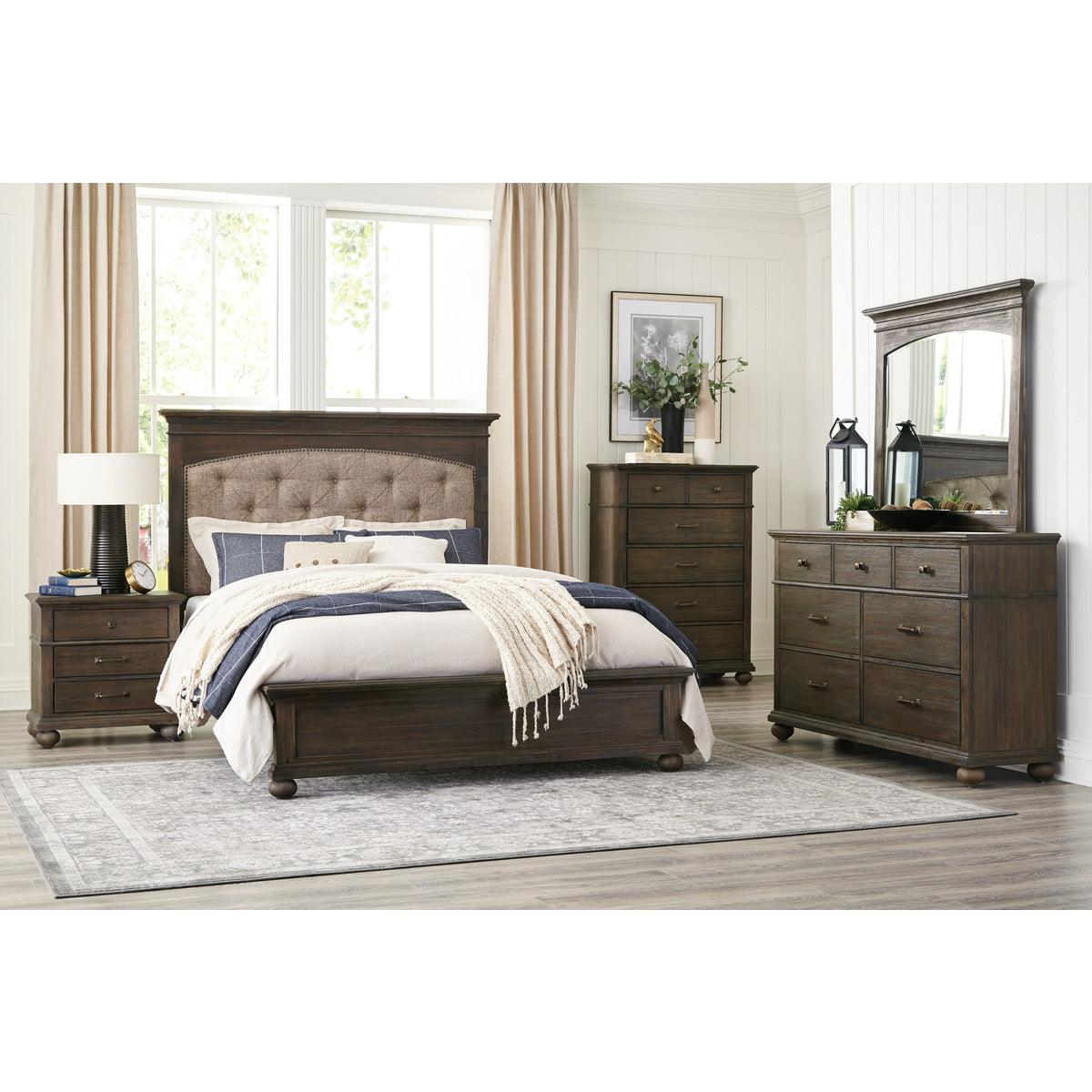 Motsinger king bed showing wire-brushed rustic brown wood finish