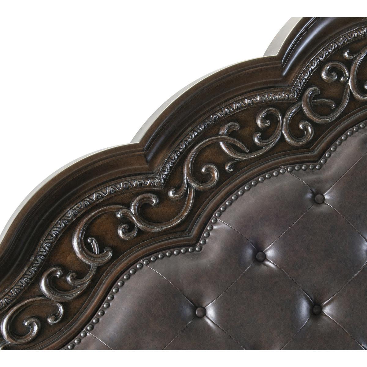 Close-up of tufted faux leather headboard with button details