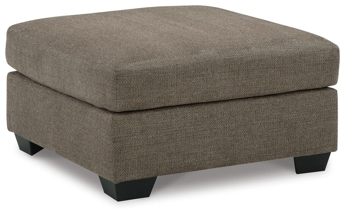 Mahoney Chocolate 2-Piece Sectional with Ottoman — angled view
