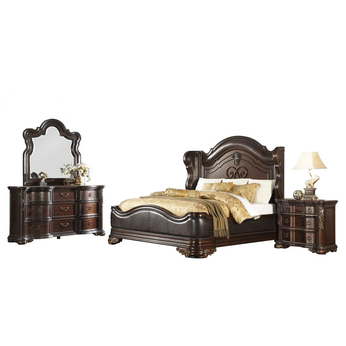 Close-up of headboard with carved scrolling and faux leather