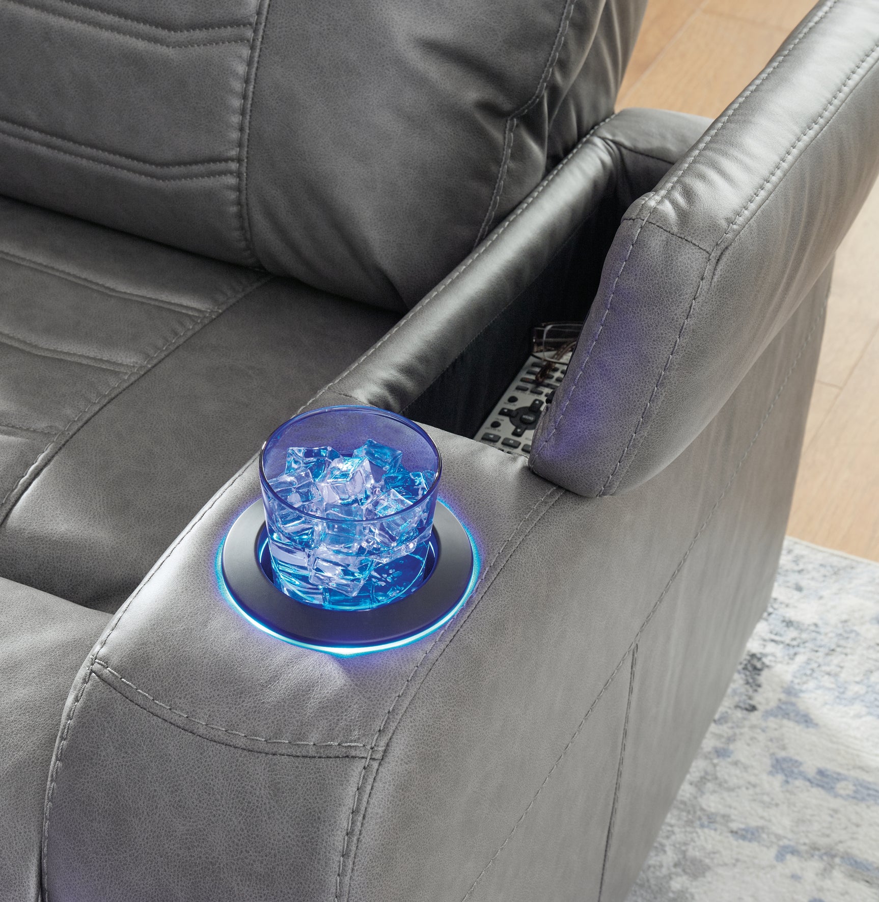 Armrest with storage and cup holder detail