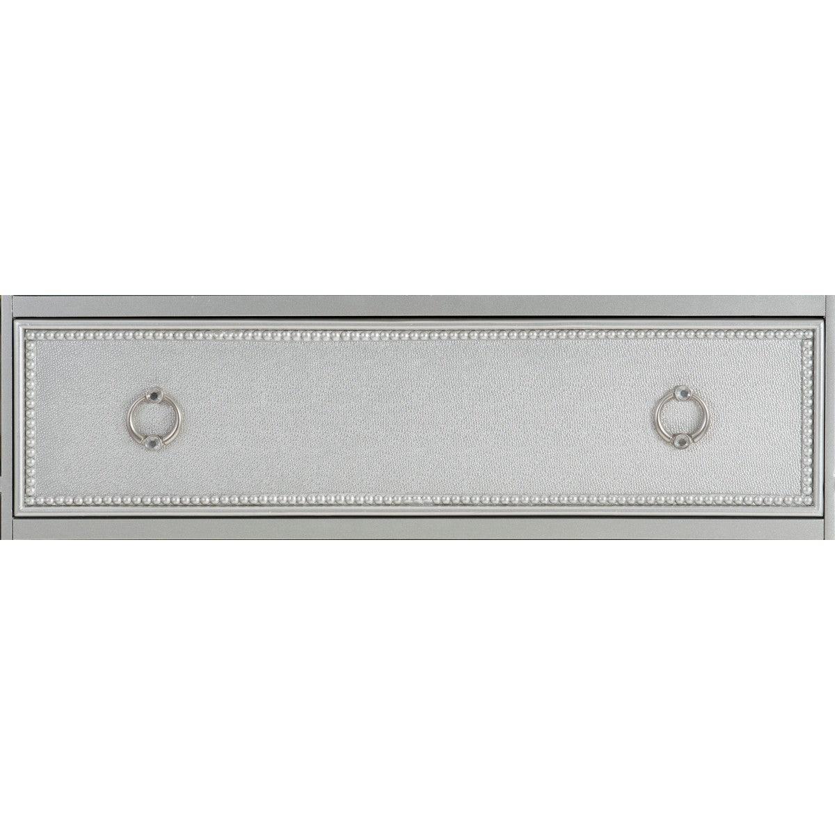 Close-up of beveled mirrored drawer fronts with silver finish