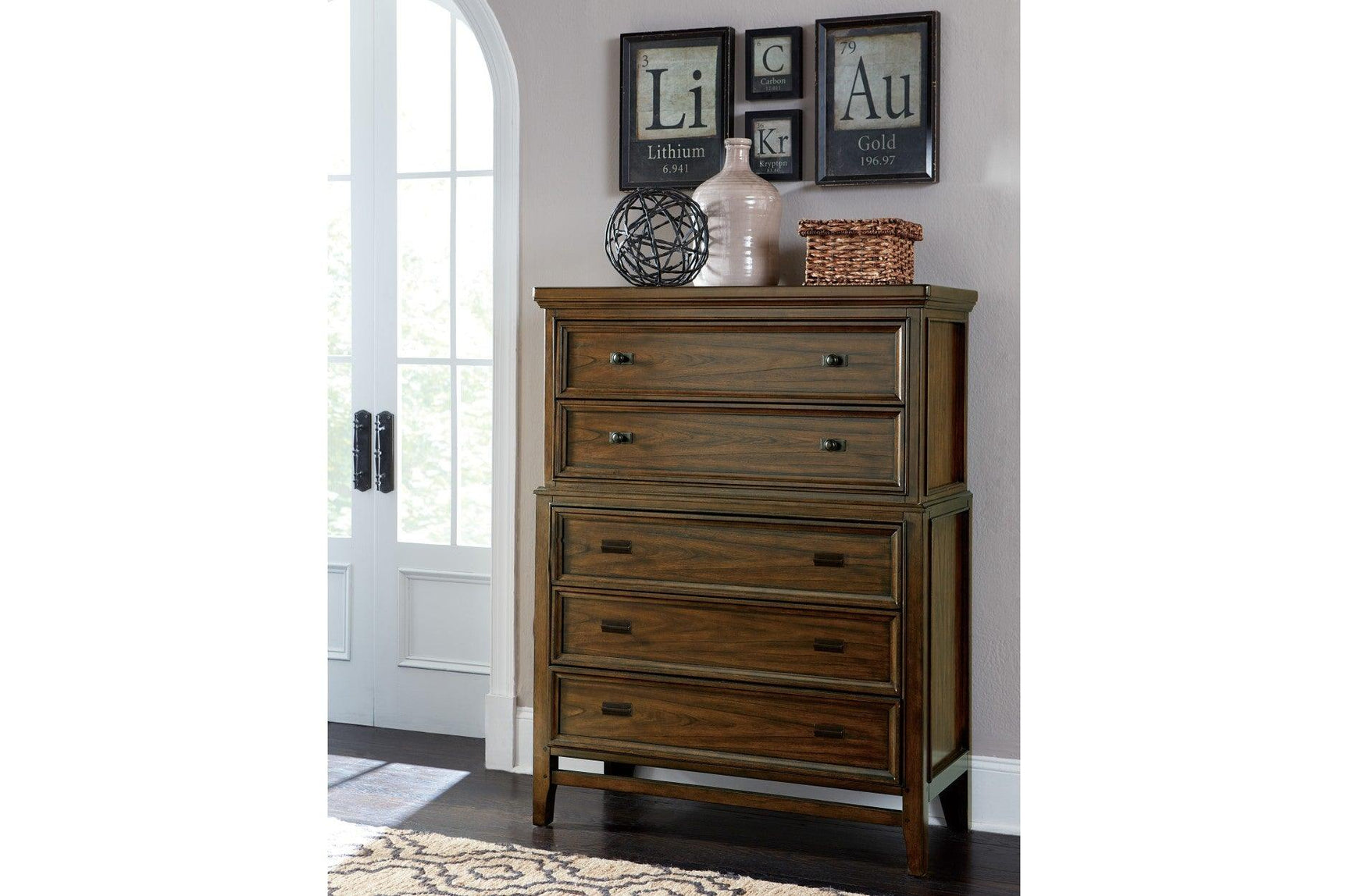 Side view of brown cherry upholstered storage platform bed