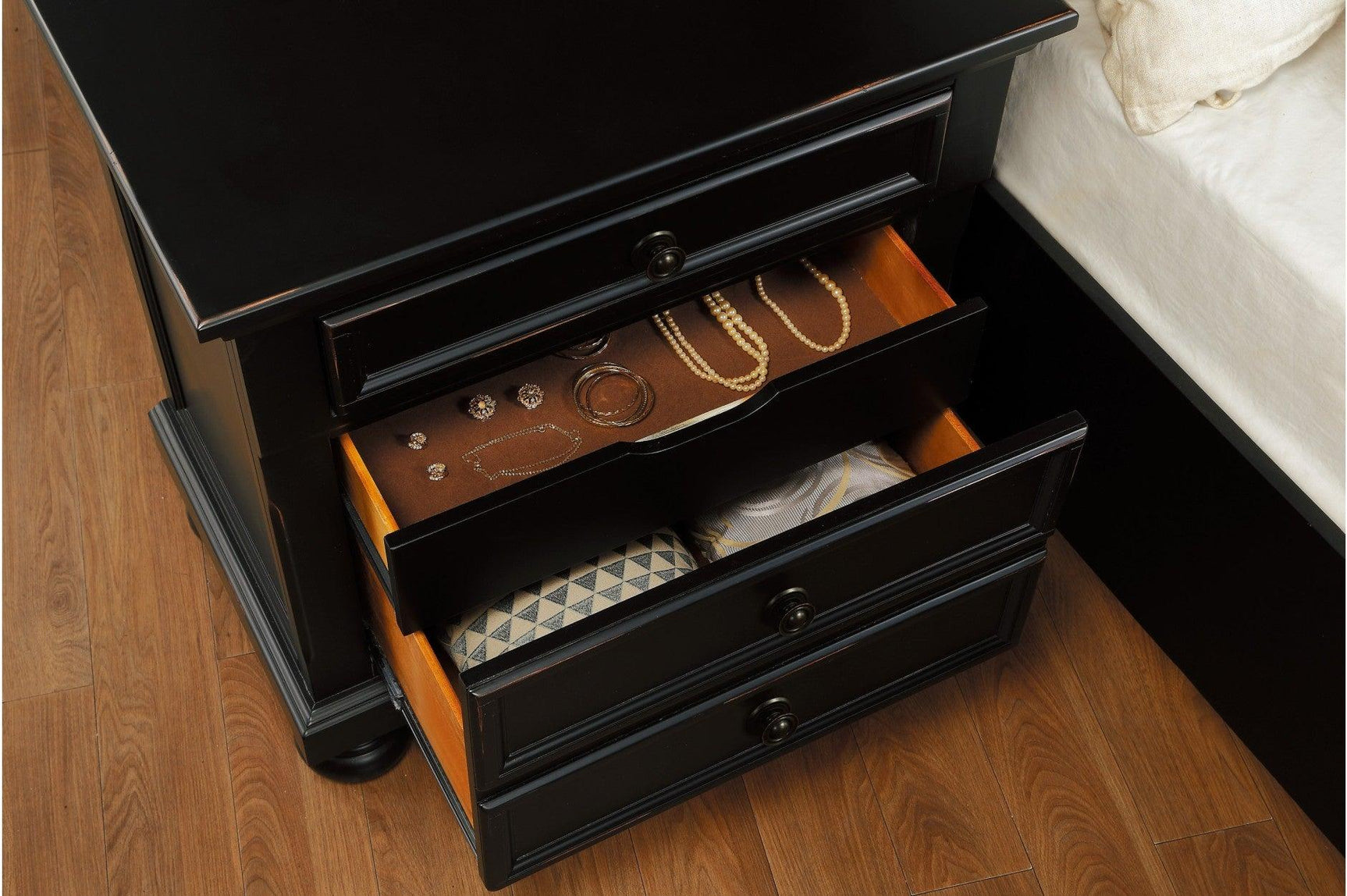 open storage drawer close-up of Laurelin Black Storage Bedroom Set bed