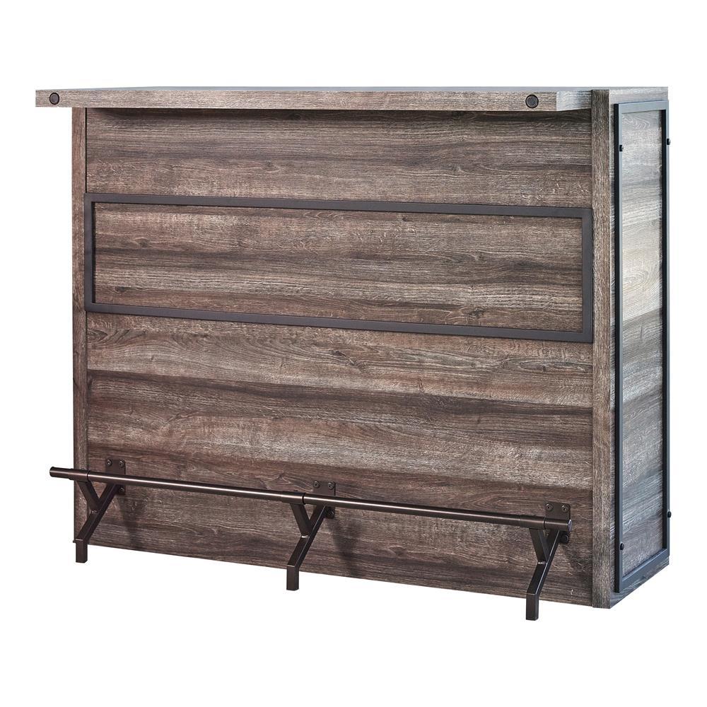 Close-up of aged oak wood finish and metal accents on bar unit