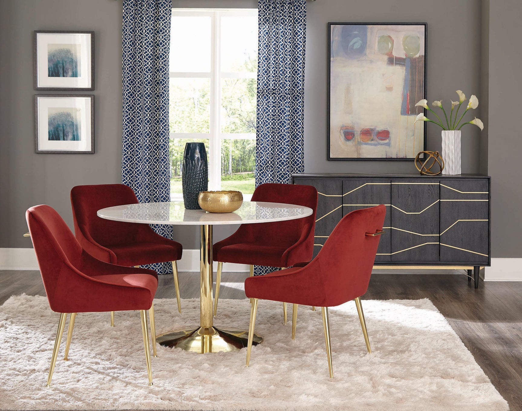 Living space featuring Kella round marble table and gold base with side chairs