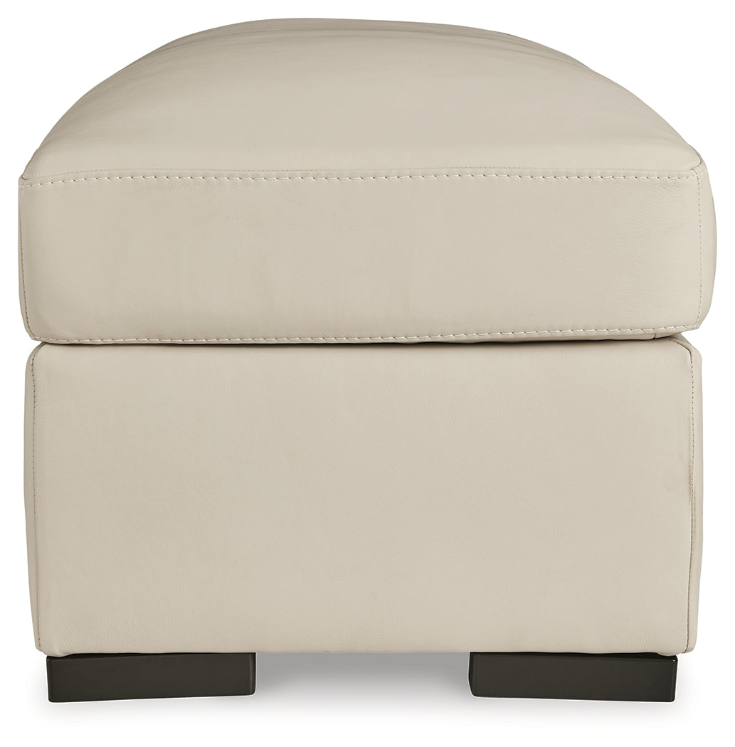 Treasure Trove Ottoman side profile almond leather match upholstery